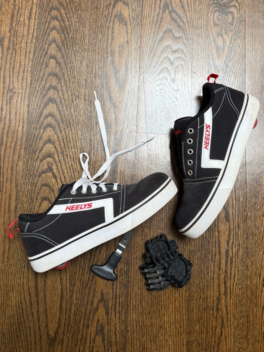 Heelys Men's Black Canvas Skate Sneakers with White Trim and Red Accents